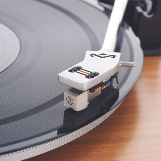 Combo Tornamesa Stir it Up turntable + Audífonos Bluetooth Little Bird HOM